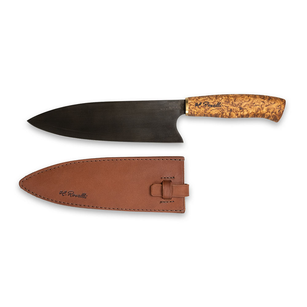 Handmade kitchen knife from Roselli, inspired by Japanese cuisine. Featuring a curly birch handle and a carbon steel blade, it comes with a handcrafted leather sheath.