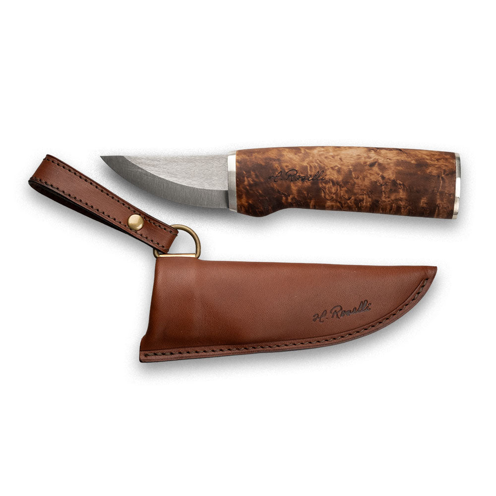 Roselli's Finnish handmade hunting knife in model "Grandfather knife". Carbon steel blade and a handmade leather sheath.